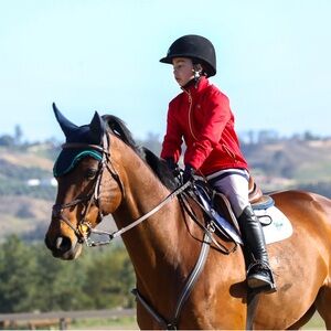 Fire red Ariat jacket. Ladies XS. Stand out in the barn or show!